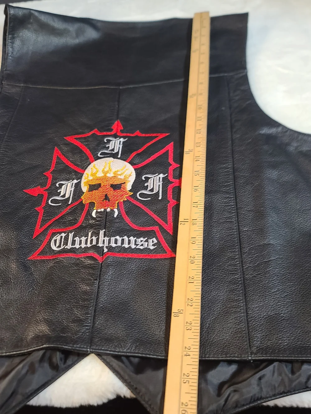 Black Leather Clubhouse Vest with Red & Orange Skull Emblem